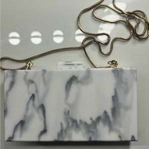 Elegant Marble Clutch with Gold Chain